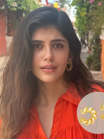 Sanjana Sanghi is absolutely slaying in our braided beauty hoops. They add the perfect touch of chunky gold to her vibrant outfit.