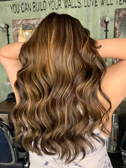 The final result of the color correction. The hair is lighter, brighter, and looks incredibly healthy.