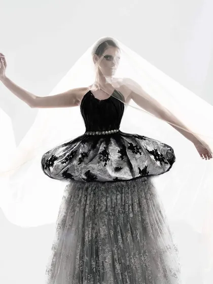 My interpretation of an elegant swan, crafted entirely with drapes for a fabric client's 'Bird' themed series. This project showcases how to create structure and narrative using only monochrome lace and tulle.