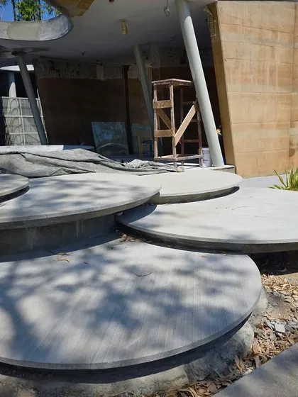 A closer view of the overlapping circular concrete platforms, which create a playful yet functional landscape feature at the resort.