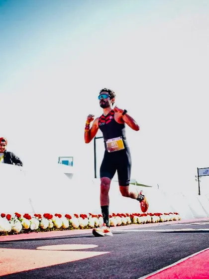 The final push to the finish line. This is the culmination of months of dedicated Ironman training, a moment of pure grit and determination that our entire community celebrates.