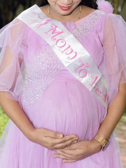 Celebrating the mom-to-be in my electric lavender gown. The delicate pearl work on the bodice and the fluttery sleeves make it a special outfit for a baby shower or photoshoot.