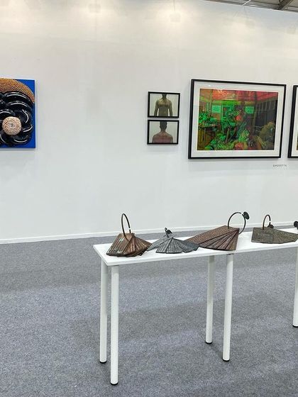 A view of the booth featuring works by G. Ravinder Reddy, Sandeep TK, and Pushpamala N.