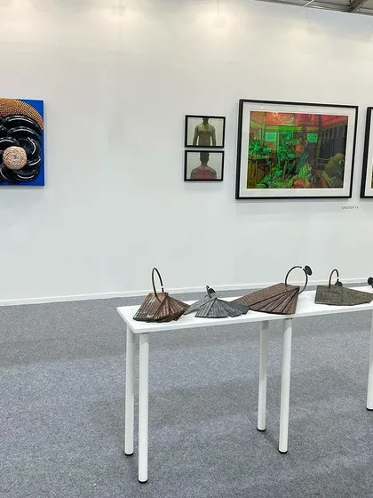 Another view of our Art Mumbai booth, showing the layout of sculptures and photographs.