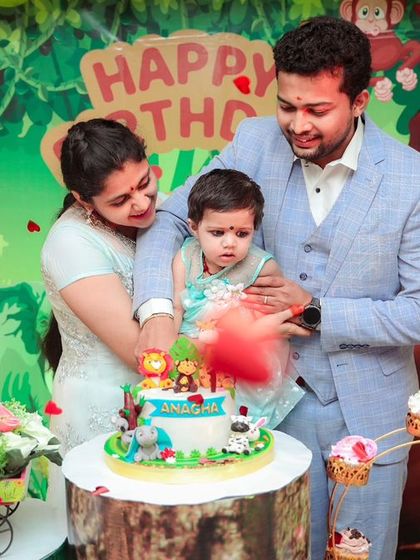 A vibrant 'Pokemon' themed birthday party, with character cutouts, a custom backdrop of the Kanto region, and red and white balloons, ready for a Pokemon battle.