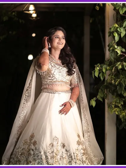 A vision of grace, the bride glows in her white lehenga on her Sangeet night. We help you look and feel your absolute best.