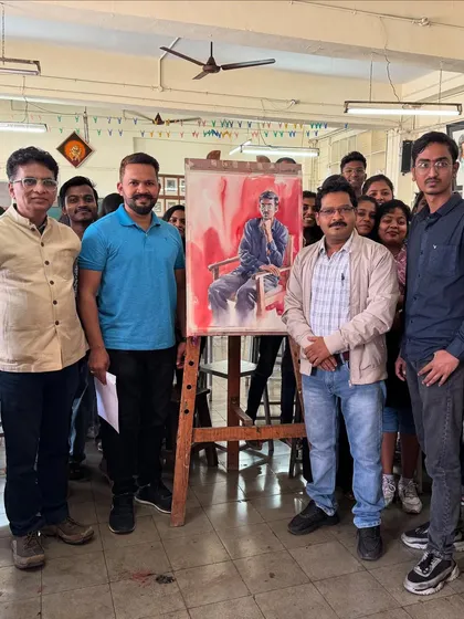 Standing with the professors who invited me back to my college to share my knowledge.