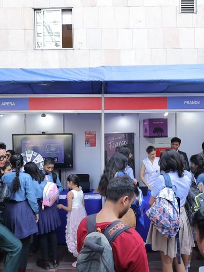 Students and visitors gather at information booths during the Francophonie Mela. These stalls provide a great opportunity to learn about different Francophone cultures and our course offerings.