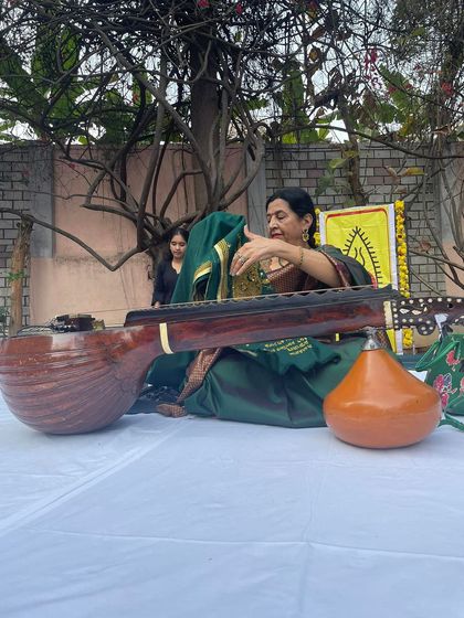 Explaining a musical concept during the SPIC MACAY concert. I believe in making these sessions interactive, breaking down complex ideas into something everyone can appreciate.