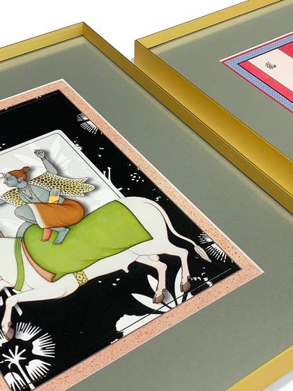 A client's exquisite artwork is given a touch of richness with our gold metal frames and grey mats. The float mounting technique adds an extra layer of dimension.