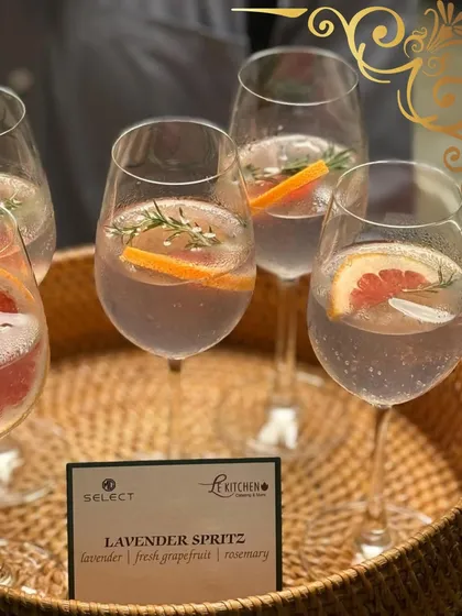A truly great drink can set the tone for an entire evening. My Lavender Spritz, infused with fresh grapefruit and rosemary, is a signature cocktail designed to be both refreshing and elegant.