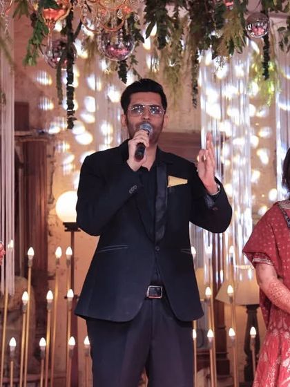 Sharing a laugh with the bride and her family on stage. It's these personal connections that make my work so fulfilling.