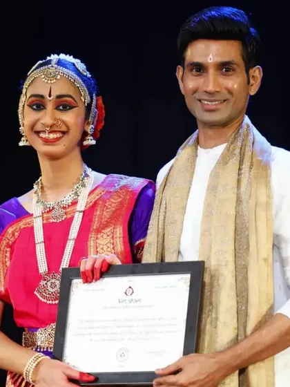 A cherished photograph with my student Sahana after her successful Arangetram. This certificate is not just an accomplishment, but a testament to her perseverance.
