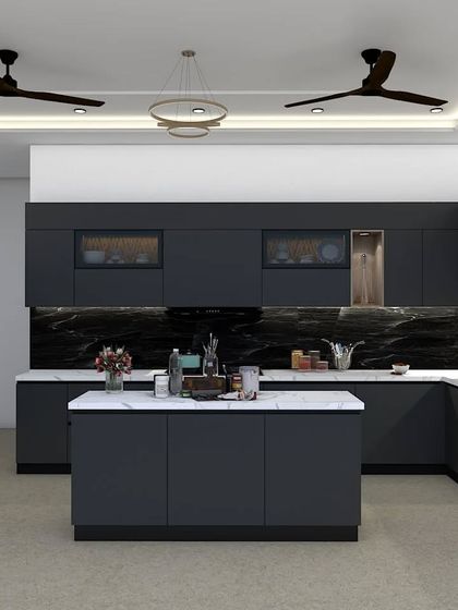 An alternate view of the U-shaped kitchen, focusing on the central island and the sleek, handle-free cabinetry. The design emphasizes clean lines and an uncluttered feel, with smart storage solutions hidden behind the minimalist facade.