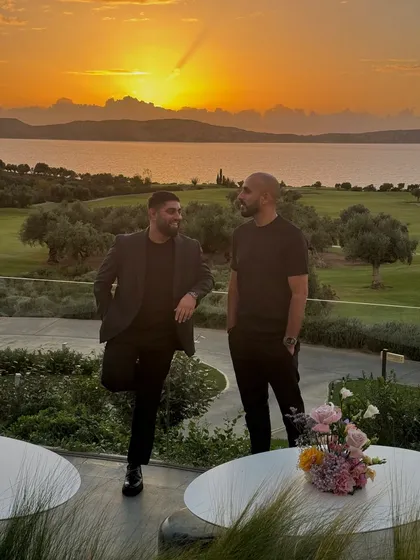 Sunset vibes in Greece with my DJ partner. We always take a moment to appreciate the incredible views at our destination gigs.