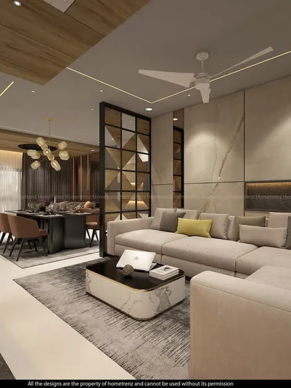 This angle highlights the spaciousness of the living room. The large L-shaped sofa, marble accent wall, and wood ceiling details all contribute to a feeling of modern luxury.