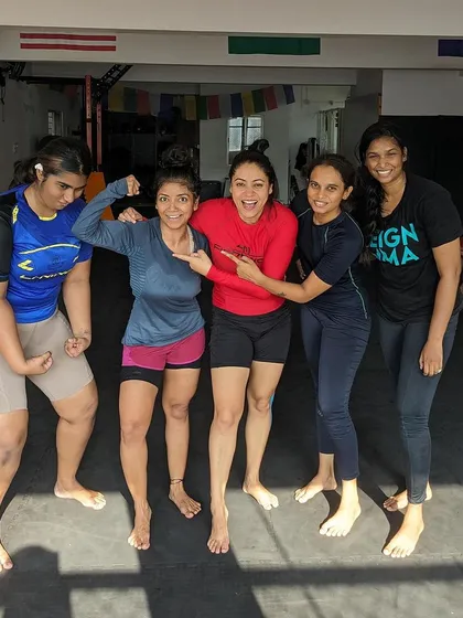 The women of Reign having a fun moment after a tough training session. We train hard, but we are also a close knit family.
