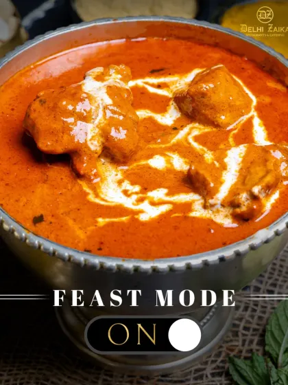 Feast Mode: ON. A stunning bowl of our signature chicken curry, rich with cream and spices, ready to be devoured.