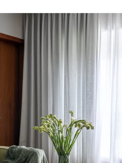 The simple elegance of a sheer curtain diffusing natural light. We use lighting, both natural and artificial, as a key material in our design palette to shape the mood of a space.