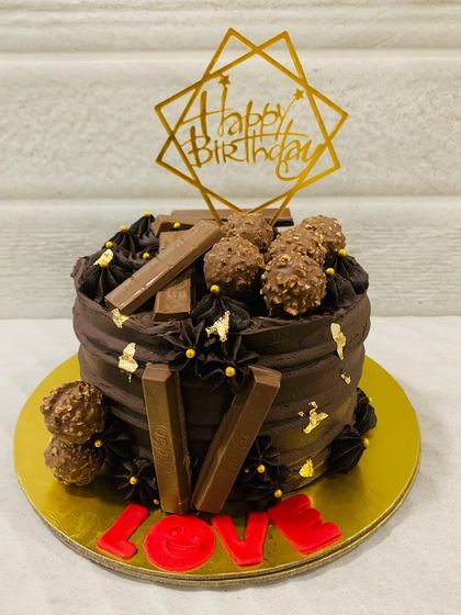 Another look at the irresistible chocolate, KitKat, and Rocher cake.