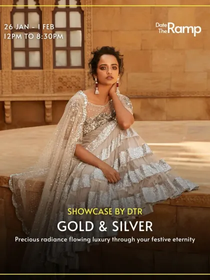 From our "Gold & Silver" showcase, this model wears a glamorous silver ruffled saree. It’s a modern take on the classic drape, perfect for receptions and cocktail parties.