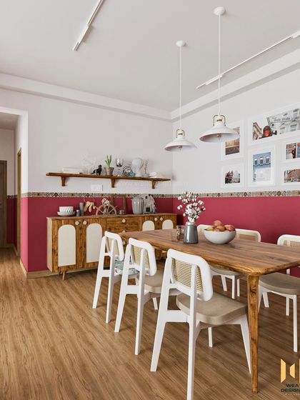 The dining area of the Prestige City project, featuring a solid wood table, white cane-back chairs, and a matching crockery unit.