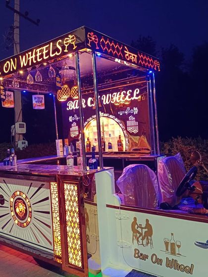 Our 'Bar on Wheels' fully stocked and ready for service. This setup is not just a novelty; it's a highly functional bar station that allows our mixologists to work efficiently and serve guests quickly.