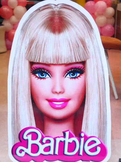 A close-up of a classic Barbie cutout, one of the many decorative elements I use to bring a theme to life and delight the kids.