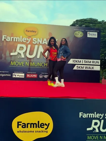 My team and I on stage at the Farmley Snack Run. I work with a dedicated team of professionals to ensure every event, like this "Move N Munch" run, is a grand success.