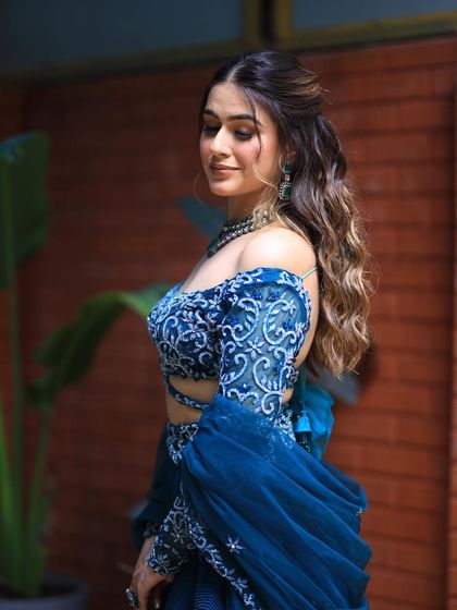 A portrait of the model, showing how the soft curls frame her face beautifully.