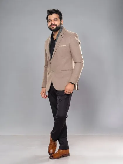 Another angle of Kshitish Date's award show attire, highlighting the clean lines and modern fit.