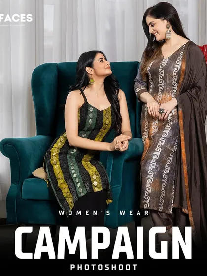 Two models in complementary printed ethnic suits pose together in a well-styled indoor setting. This campaign image is crafted to show collection diversity and create a relatable, aspirational scene.