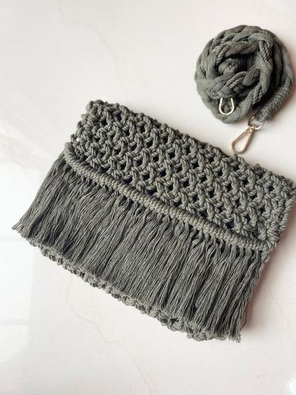 This is my classic boho sling bag in a beautiful olive green. It comes with a detachable macrame strap so you can wear it however you like.