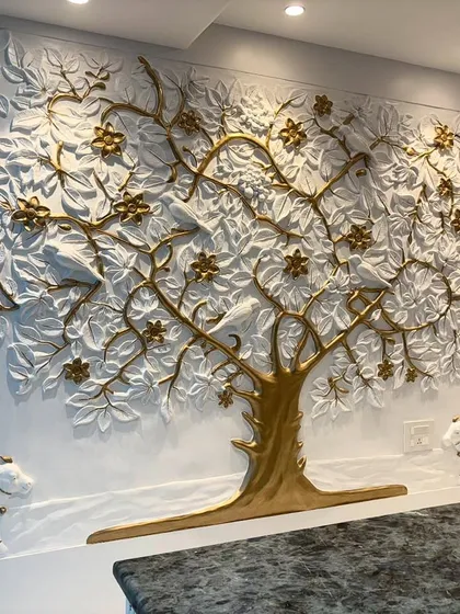 The Kalpavriksha tree mural viewed from across the desk, showing how it serves as a stunning and meaningful piece of art for the main office room.