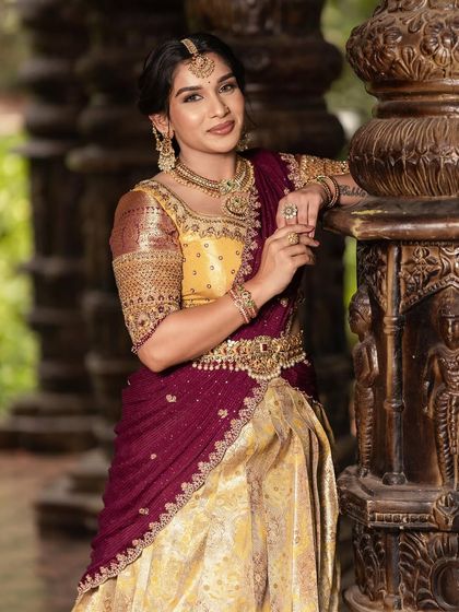 A portrait against a traditional backdrop, showcasing the elegance of the look.