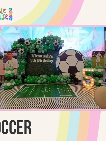 Our Soccer theme creates a mini-stadium feel with a grass-like floor, a giant inflatable soccer ball, and goal-worthy balloon arrangements.