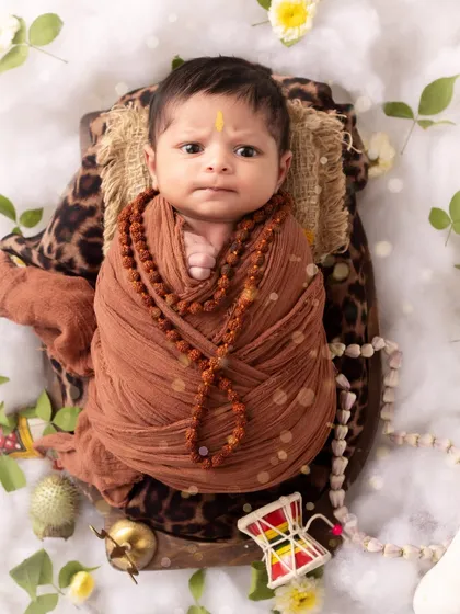 A wide-eyed little Shiva. Even when they are awake, I can capture beautiful, calm moments during a newborn session.