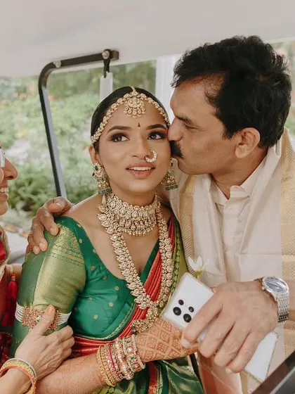 A precious moment captured between the bride and her parents during her Mahuratham ceremony. For her South Indian bridal look, I focused on traditional elements like a defined eye and radiant skin that would last through all the emotional and happy moments.