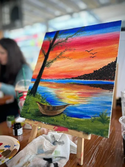 Look at this beautiful sunset scene created by a participant! It’s amazing to see people, many of whom are painting for the first time, create such stunning pieces. You'll surprise yourself with what you can do.