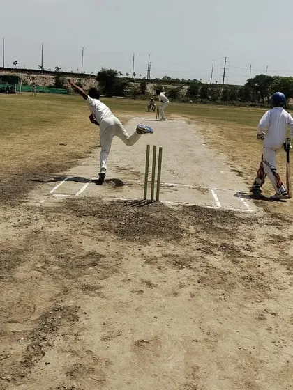 Action during one of our practice matches. We use a well-maintained turf wicket to give our players real match simulation, helping them adapt their bowling and batting techniques to actual game conditions. This is where skills are truly tested.