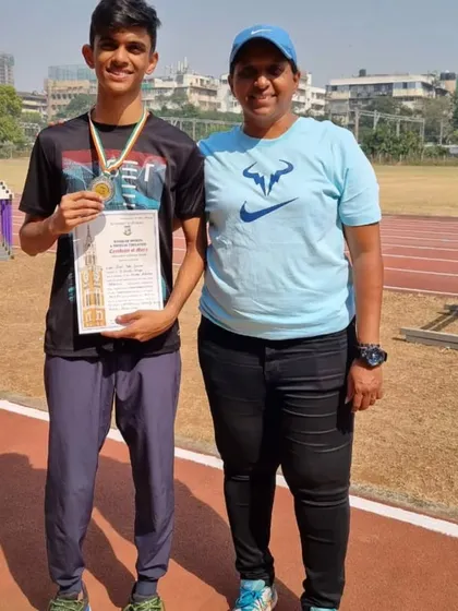 With my athlete Yash Joshi after he won a silver medal in the 400m run at the Mumbai University Inter Zonal Athletics Meet.