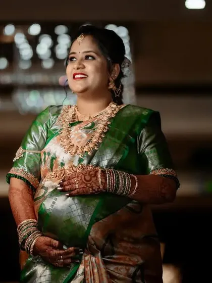 Another glowing portrait of the mother-to-be, capturing her joy and anticipation during the baby shower ceremony.
