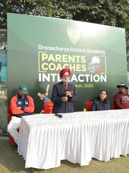 Our director, carrying forward the legacy of his father, addresses parents and coaches. His leadership ensures that the founding principles of discipline and excellence are upheld in every aspect of our academy's operations.