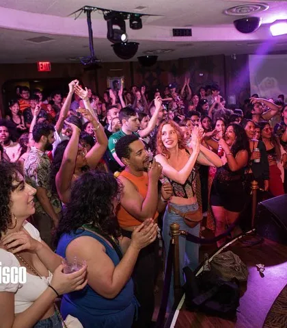 The crowd at Bollywood Disco: Proud Edition, fully immersed in the performance. It's a night of celebration, music, and community.