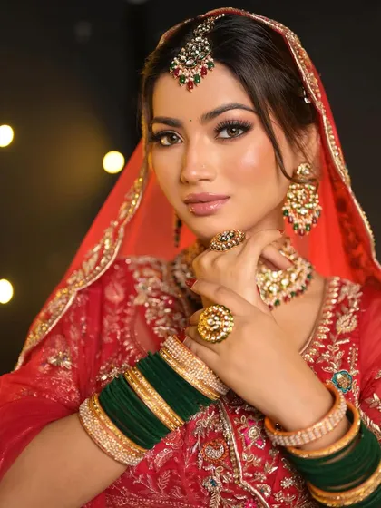A close-up showing the details of the makeup and jewelry. The green bangles add a beautiful pop of color that I complemented with subtle tones in the makeup.
