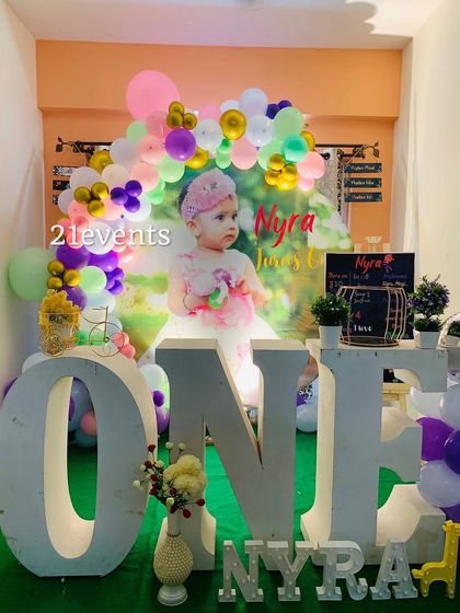 A full view of the photo-centric birthday setup, perfect for home parties.