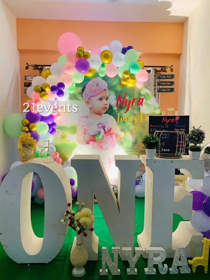 A full view of the photo-centric birthday setup, perfect for home parties.