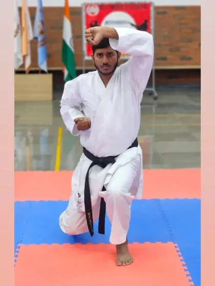 A student holds a perfect kata stance, demonstrating the focus and physical control required for this discipline.