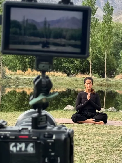 Behind the scenes of filming a yoga session in a beautiful location in Leh. The goal is to capture the feeling of practicing in these incredible landscapes.