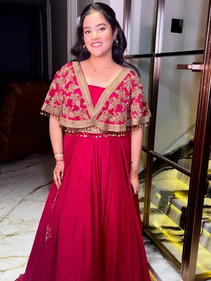 The full look, a beautiful red gown perfect for a wedding reception or cocktail party.